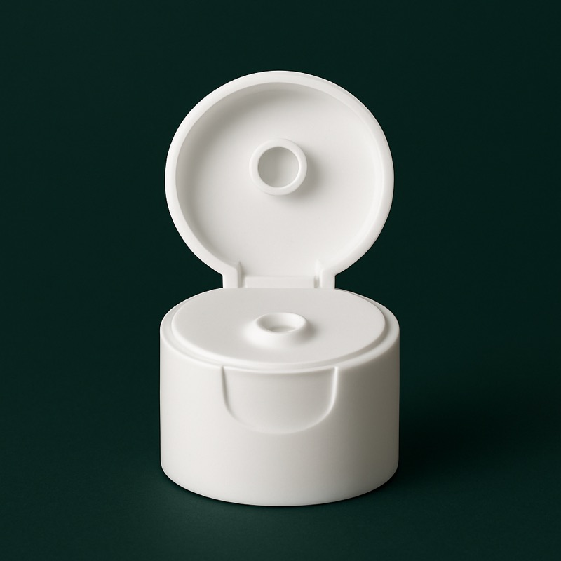Disc Top Cap — custom packaging by TWO Packaging